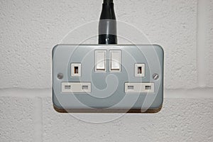 UK mains electrical socket, twin, metal industrial type photo